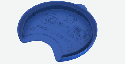 Text on a blue injection-molded part