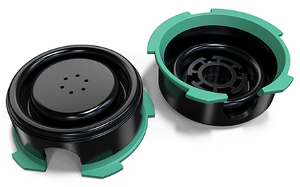 Black and green injection molded parts