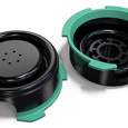 Black and green injection molded parts