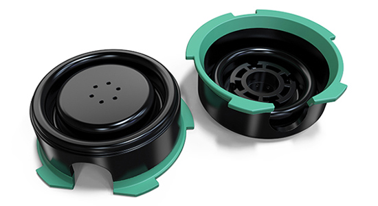 Black and green injection molded parts