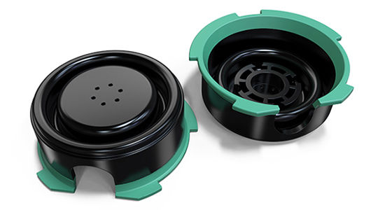 Schwarze und grüne Spritzgussteile