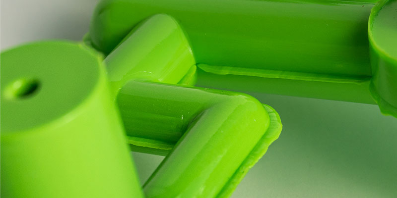 Green plastic part