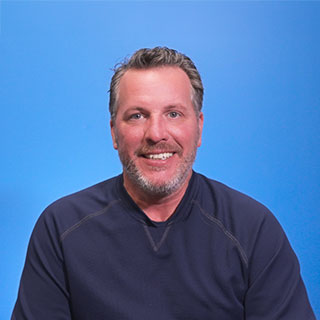 headshot of Mike Adams
