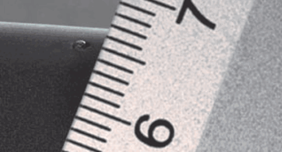 Hot tip gate vestige on plastic part