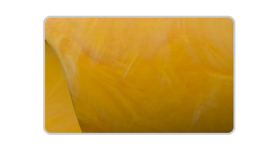 Injection-moulded nylon sample with swirling colourant