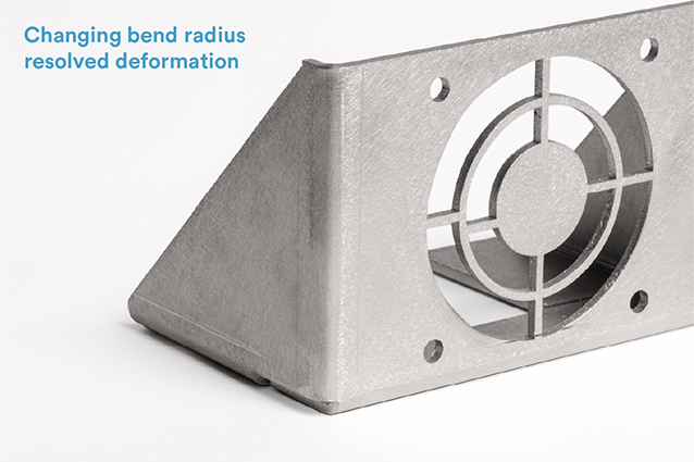 In this situation, reducing the size of the internal bend radius was a sufficient solution and provided the additional material needed to keep the fan cutout and holes from deforming.