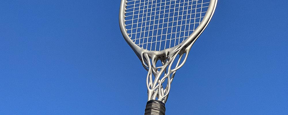 Tennis racket with blue background