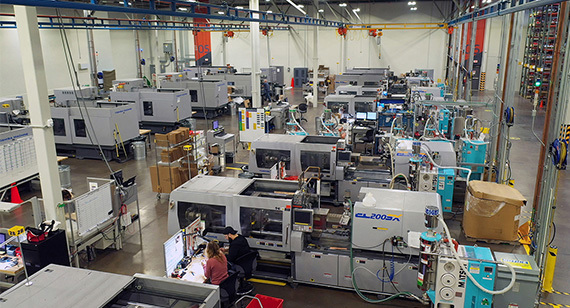 Megamold injection molding presses