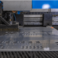 sheet metal part being cut on laser cutting machine